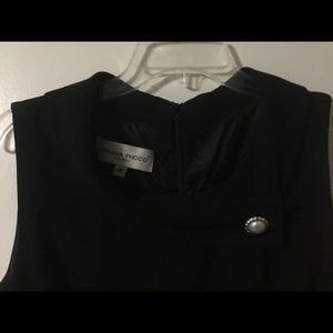 Sold/Classy Black beautiful dress W/Pearl Button.
